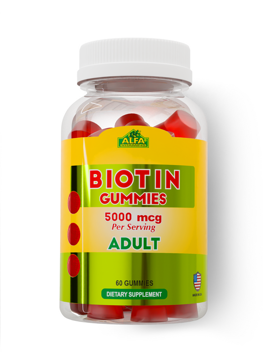 A clear bottle with a white cap contains red biotin gummies labeled Biotin 5000mcg Adults - 60 Gummies from Alfa Vitamins Store. Designed for hair growth and nail strengthening, the yellow and green label features a small American flag and denotes Dietary Supplement.
