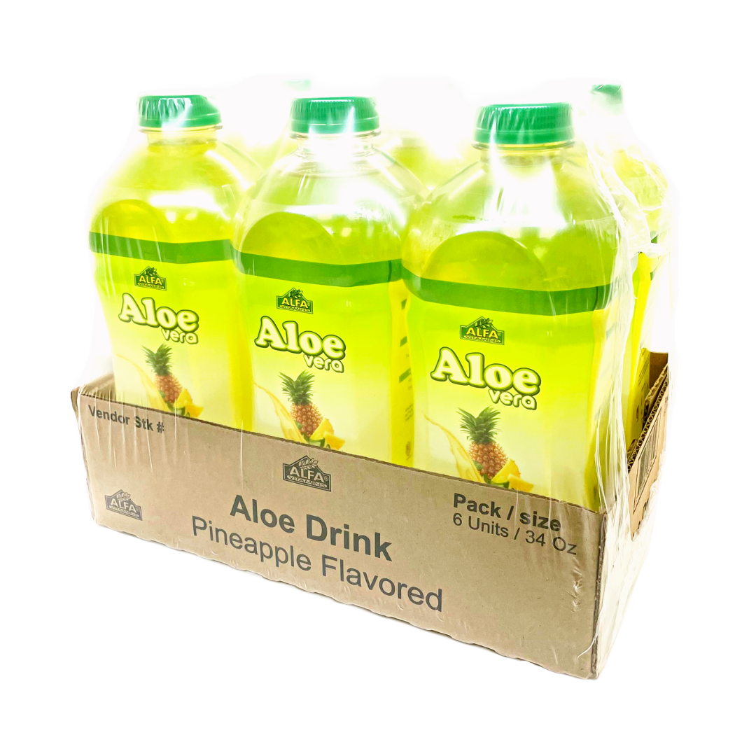 A pack of six Alfa Vitamins Aloe Vera Drink-Pineapple bottles is displayed in a cardboard tray. The translucent bottles have green caps, and the label features a pineapple image, promoting the drink as refreshing support for the digestive system.