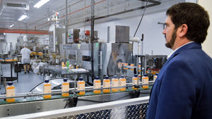 Alfa Vitamins CEO watches production in his manifacture