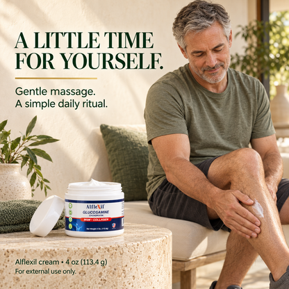 Adult man gently massaging Alflexil cream onto intact leg skin during a daily massage routine.