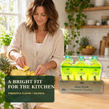 Aloe Vera Drink pineapple six-pack in a bright kitchen lifestyle scene
