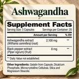 Ashwagandha Supplement Facts in a tan card with natural shadows: three capsules per serving, 2100 mg ashwagandha extract and 8 mg black pepper extract.