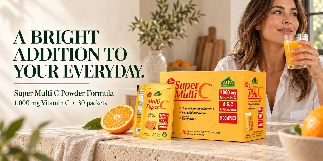 Alfa Super Multi C powder box and packets beside an orange drink in a sunlit kitchen