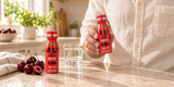 Alfa B12 Shot with fresh cherries — routine scene.