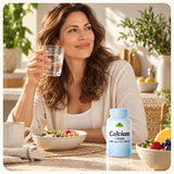 An adult at a breakfast table with Calcium Citrate and water.