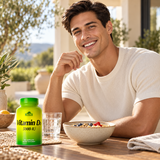 A man at a balcony breakfast with Alfa Vitamin D3