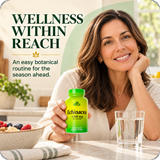 Woman holding Alfa Vitamins Echinacea during a kitchen routine.