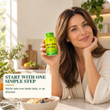 Woman holding Alfa Folic Acid in a natural morning routine.