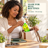 Woman with Alfa Folic Acid during a natural workday routine.