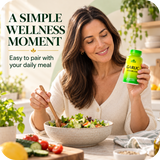 Woman holding Alfa Garlic Odorless in a natural kitchen routine.