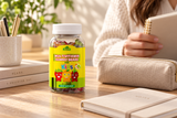 Closed Alfa Multivitamin Gummy Bears for Kids bottle beside an adult planner.