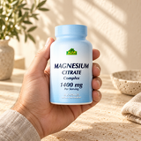 Magnesium Citrate Complex 60 capsules closed package held in an adult hand