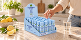 Alfa Magnesium Complex Shot with lemon — 20-bottle display in a cream kitchen.