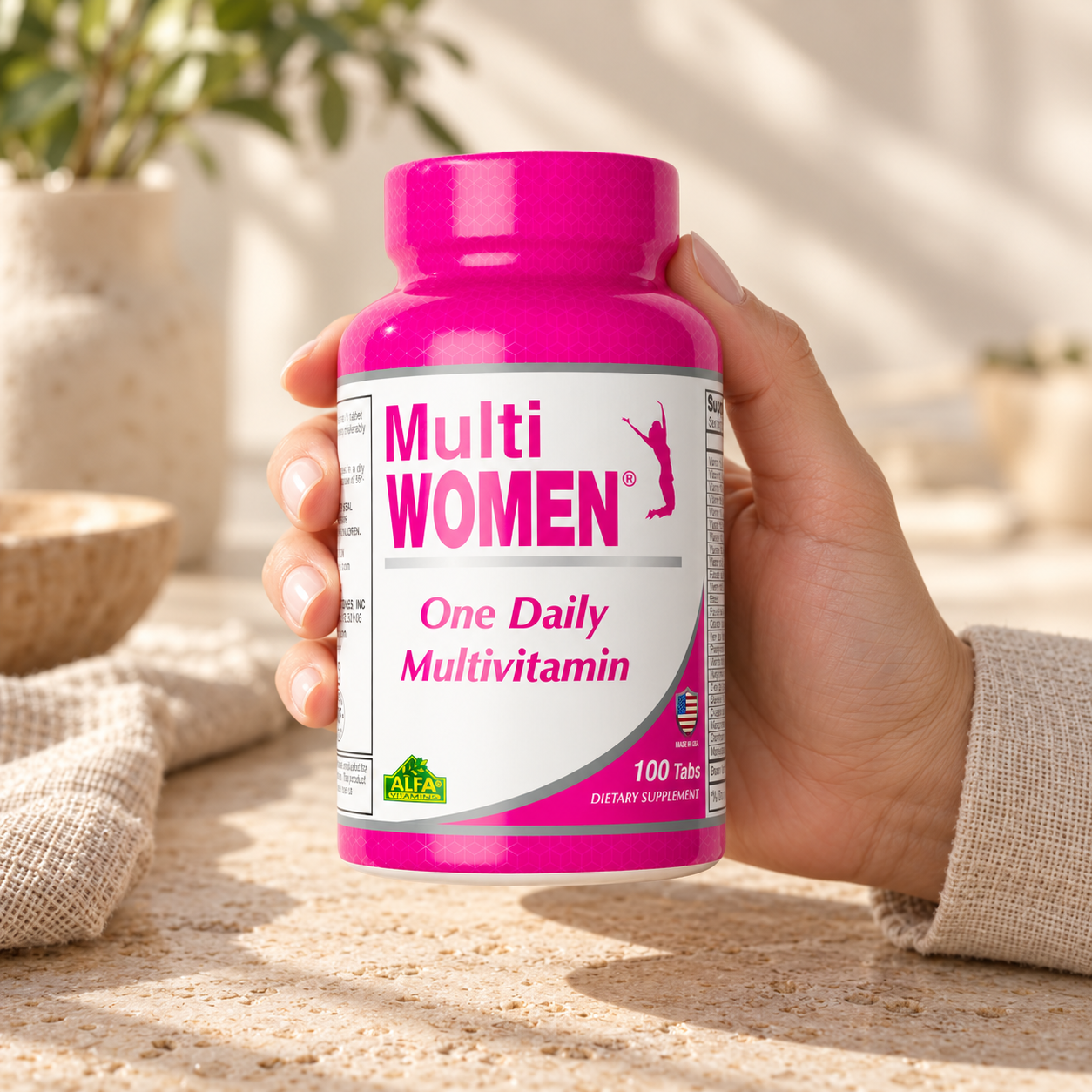 Multi Women closed package held in an adult hand