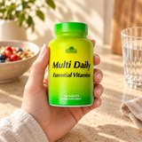 Multi Daily Essential Vitamins closed package held in an adult hand