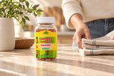 Closed Alfa Turmeric Ginger Gummies Adult bottle on a kitchen counter.