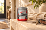 L-Carnitine 3000 mg Powder - Unflavored - 200 g package on an entryway console beside a canvas tote.