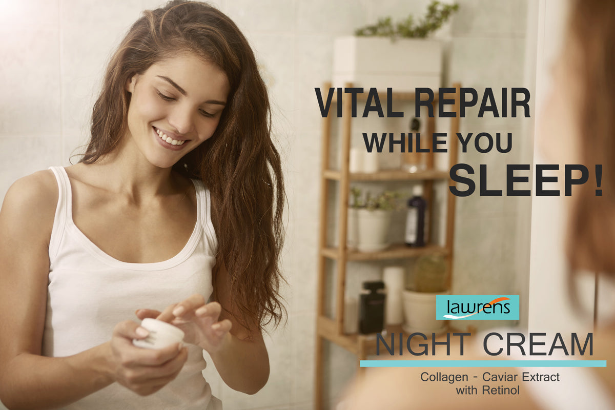 A woman smiles while applying Alfa Vitamins Night Cream with Collagen, Caviar Extract & Retinol in a bathroom. Text on the image reads VITAL REPAIR WHILE YOU SLEEP!.